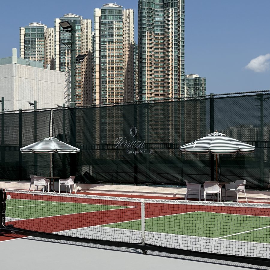 Outdoor pickleball court with skyline view at Terraza Racquets Club