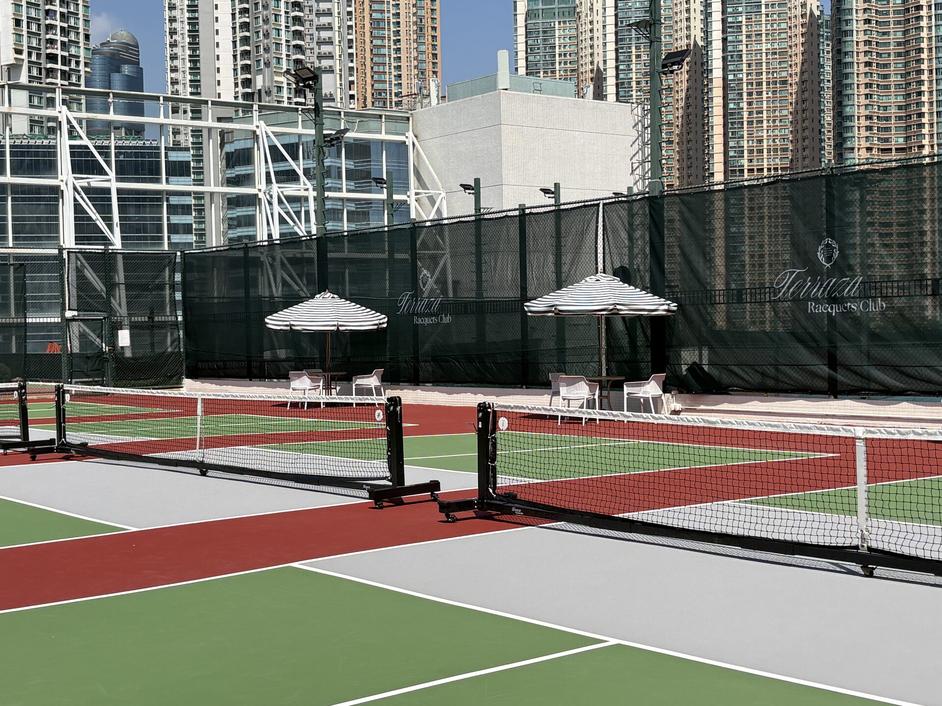 Outdoor competition-grade pickleball court at Terraza Racquets Club